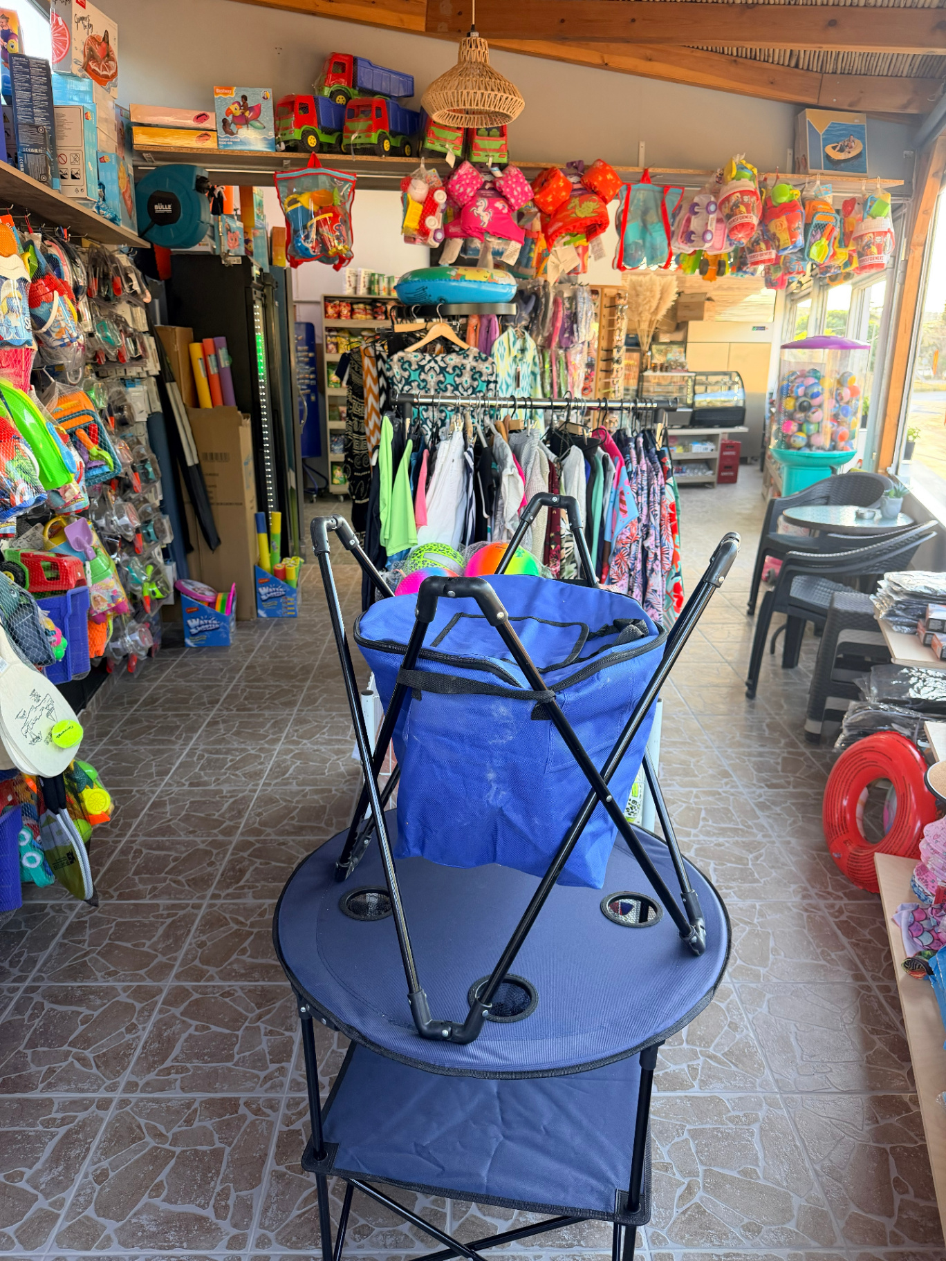 Foldable beach chairs cooler bags swimwear and pool floats at AMOS SEASIDE near JW Marriott Crete